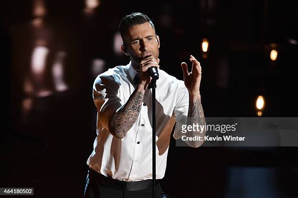 Singer Adam Levine of Maroon 5 performs "Lost Stars" from "Begin Again" onstage during the 87th Annual Academy Awards at Dolby Theatre on February...
