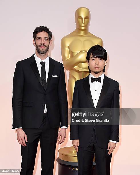 Producer Julien Feret and writerdirector Hu Wei attend the 87th Annual Academy Awards at Hollywood & Highland Center on February 22, 2015 in...