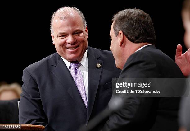 New Jersey Senate President Steve Sweeney greets New Jersey Gov. Chris Christie prior to being sworn in for his second term on January 21, 2014 at...