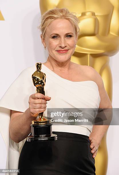 Actress Patricia Arquette winner of the award for Best Actress in a Supporting Role for 'Boyhood' poses in the press room during the 87th Annual...