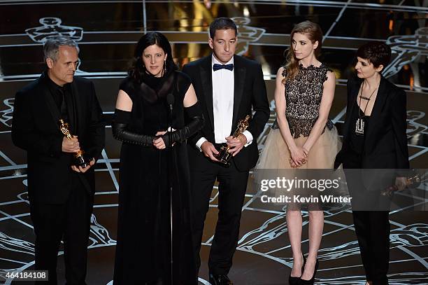 Director Laura Poitras, Dirk Wilutzky, Lindsay Mills and journalist Glenn Greenwald accept Best Documentary Feature Award for "Citizenfour" onstage...