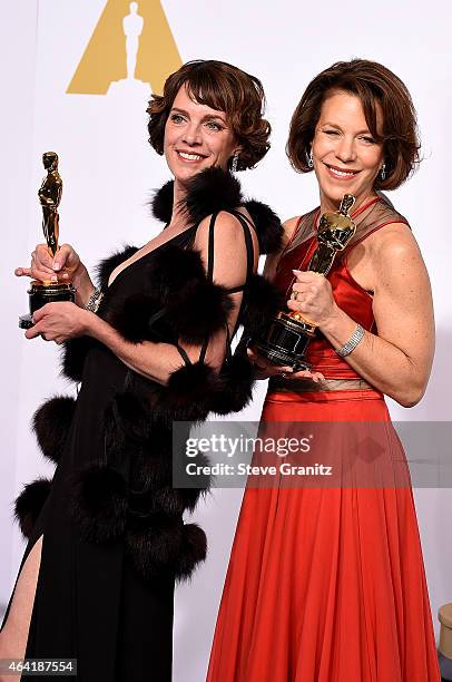 Producers Dana Perry and Ellen Goosenberg Kent pose with their award in the press room during the 87th Annual Academy Awards at Loews Hollywood Hotel...