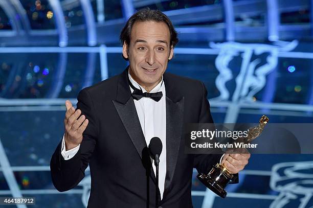 Alexandre Desplat accepts the Best Achievement in Music Written for Motion Pictures, Original Score for "The Grand Budapest Hotel" onstage during the...