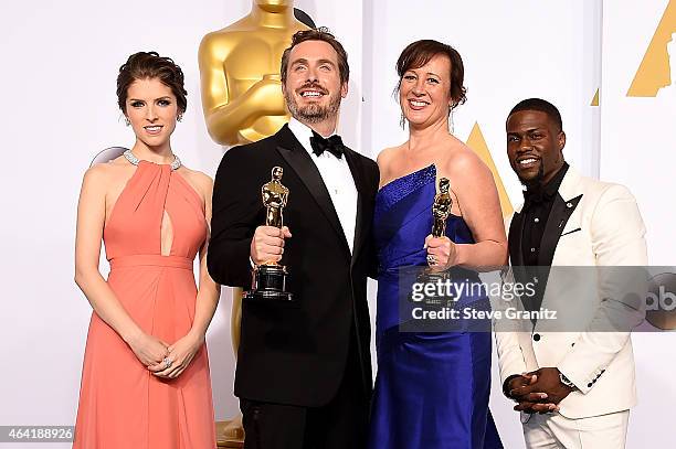 Presenter Anna Kendrick, winners Patrick Osborne and Kristina Reed, and presenter Kevin Hart pose in the press room during the 87th Annual Academy...