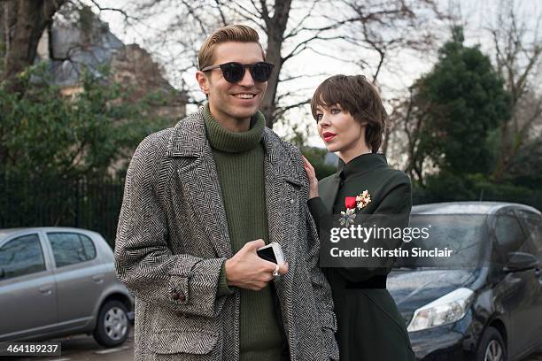 Marketing director Frol Burimskiy and Fashion designer and photographer Ulyana Sergeenko who wears her own design dress day 1 of Paris Haute Couture...