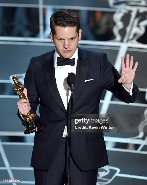 Screenwriter Graham Moore accepts the Best Adapted Screenplay Award for "The Imitation Game" onstage during the 87th Annual Academy Awards at Dolby...