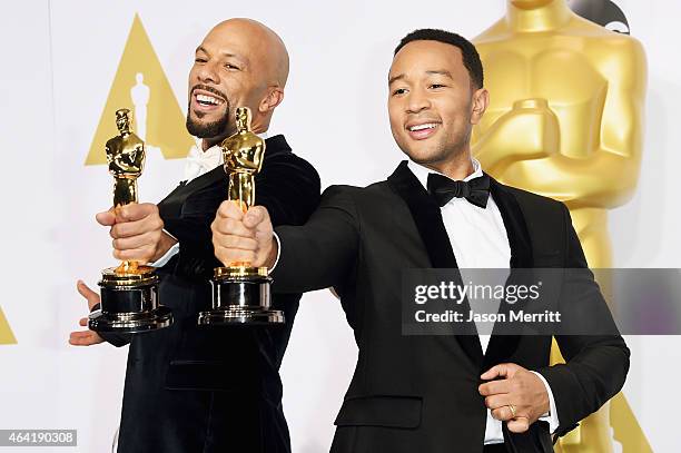 Lonnie Lynn aka Common and John Stephens aka John Legend winners of the Best Original Song Award for 'Glory' from 'Selma' pose in the press room...