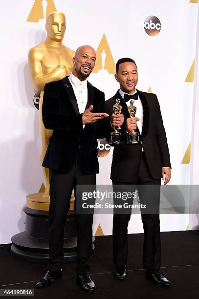 Recording artists Common and John Legend pose in the press room during the 87th Annual Academy Awards at Loews Hollywood Hotel on February 22, 2015...