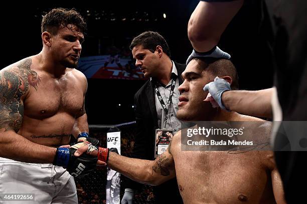 Frank Mir of the United States greets Antonio "Bigfoot" Silva of Brazil after won their heavyweight bout during the UFC Fight Night at Gigantinho...