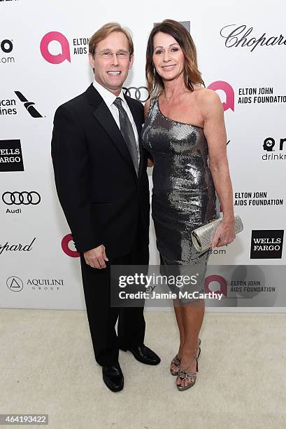 Gymnast Nadia Comaneci and Bart Conner attend the 23rd Annual Elton John AIDS Foundation Academy Awards Viewing Party on February 22, 2015 in Los...