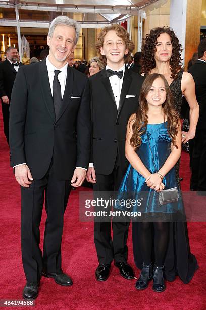 Editor William Goldenberg poses with guests at the 87th Annual Academy Awards at Hollywood & Highland Center on February 22, 2015 in Hollywood,...