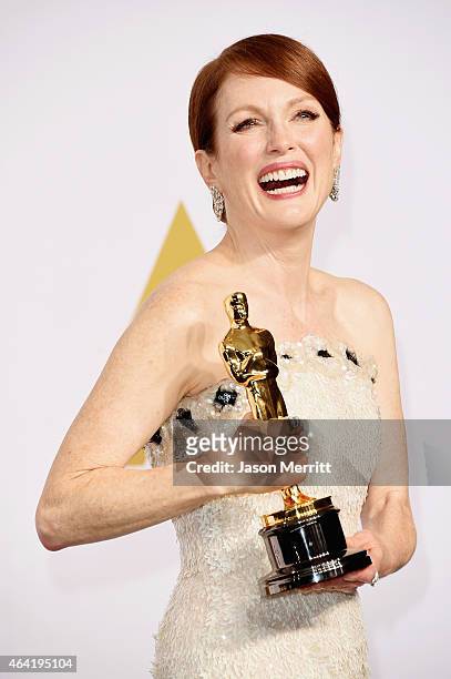 Actress Julianne Moore winner of the Best Actress in a Leading Role Award for 'Still Alice' poses in the press room during the 87th Annual Academy...