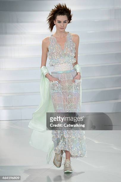 Model walks the runway at the Chanel Spring Summer 2014 fashion show during Paris Haute Couture Fashion Week on January 21, 2014 in Paris, France.