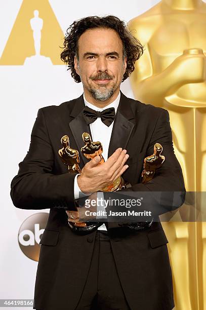 Director Alejandro Gonzalez Inarritu, winner of Best Original Screenplay, Best Director, and Best Motion Picture, for 'Birdman' poses in the press...