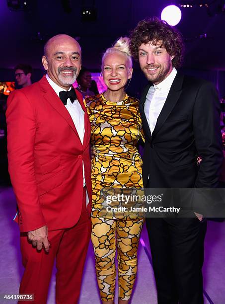 Fashion designer Christian Louboutin, recording artist Sia and producer Erik Anders Lang attend the 23rd Annual Elton John AIDS Foundation Academy...