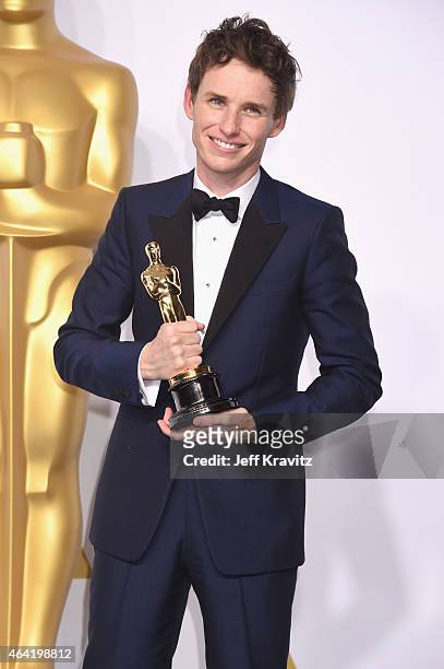 Actor Eddie Redmayne, with the award for best actor for "The Theory of Everything", poses in the press room during the 87th Annual Academy Awards at...