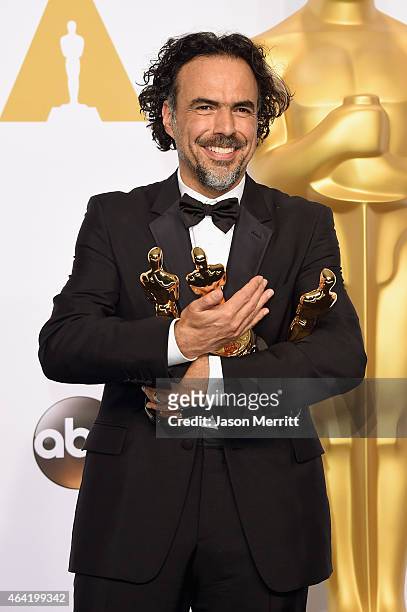Director Alejandro Gonzalez Inarritu, winner of Best Original Screenplay, Best Director, and Best Motion Picture, for 'Birdman' poses in the press...