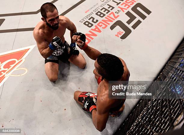 Iuri Alcantara of Brazil greets Frankie Saenz of the United States in their bantamweight bout during the UFC Fight Night at Gigantinho Gymnasium on...