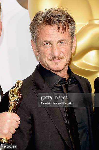 Presenter Sean Penn poses in the press room during the 87th Annual Academy Awards at Loews Hollywood Hotel on February 22, 2015 in Hollywood,...