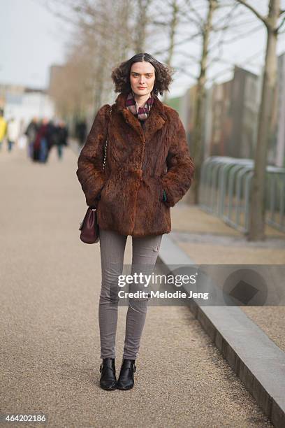 British model Sam Rollinson exits the Preen show in hair by Syd Hayes during London Fashion Week Fall/Winter 2015/16 at a 1 Pancras Square on...