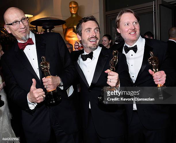 Chris Williams, Roy Conli, and Don Hall, winners of the Best Animated Feature Award for 'Big Hero 6 attends the 87th Annual Academy Awards Governors...