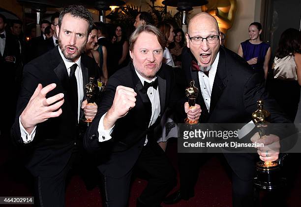 Chris Williams, Don Hall and Roy Conli, winners of the Best Animated Feature Award for 'Big Hero 6 attends the 87th Annual Academy Awards Governors...