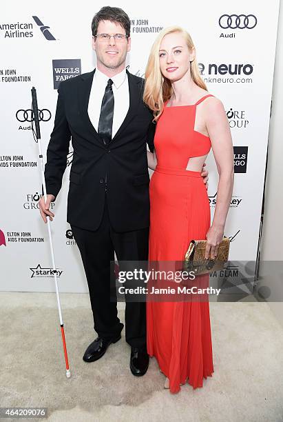 Actors E.J. Scott and Deborah Ann Woll attend the 23rd Annual Elton John AIDS Foundation Academy Awards Viewing Party on February 22, 2015 in Los...