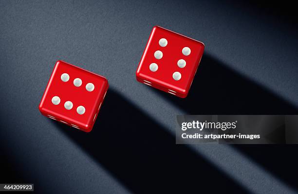 two red dices showing six points - red dice stock pictures, royalty-free photos & images