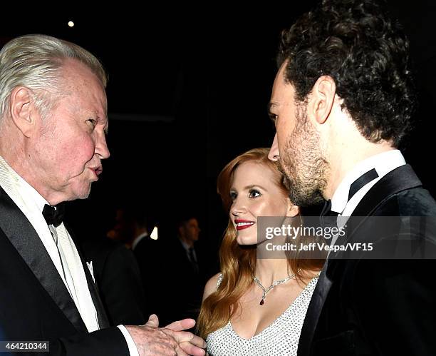 Actor Jon Voight, actress Jessica Chastain, and Gian Luca Passi de Preposulo attend the 2015 Vanity Fair Oscar Party hosted by Graydon Carter at the...