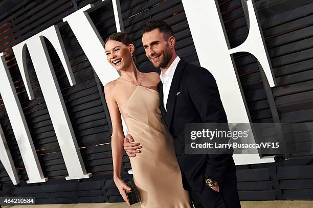 Model Behati Prinsloo and recording artist Adam Levine attend the 2015 Vanity Fair Oscar Party hosted by Graydon Carter at the Wallis Annenberg...