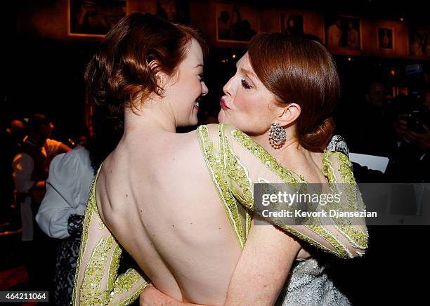 Actresses Emma Stone and Julianne Moore attend the 87th Annual Academy Awards Governors Ball at Hollywood & Highland Center on February 22, 2015 in...