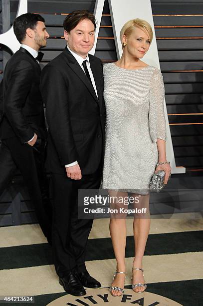 Actor Mike Myers and Kelly Tisdale attend the 2015 Vanity Fair Oscar Party hosted by Graydon Carter at Wallis Annenberg Center for the Performing...