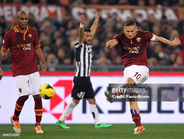 Francesco Totti of AS Roma kicks the ball during the TIM Cup match between AS Roma and Juventus FC at Olimpico Stadium on January 21, 2014 in Rome,...