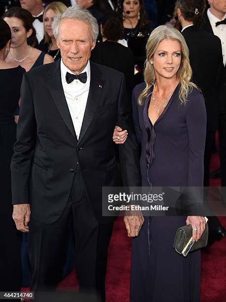 Actor/director Clint Eastwood and Christina Sandera attend the 87th Annual Academy Awards at Hollywood & Highland Center on February 22, 2015 in...