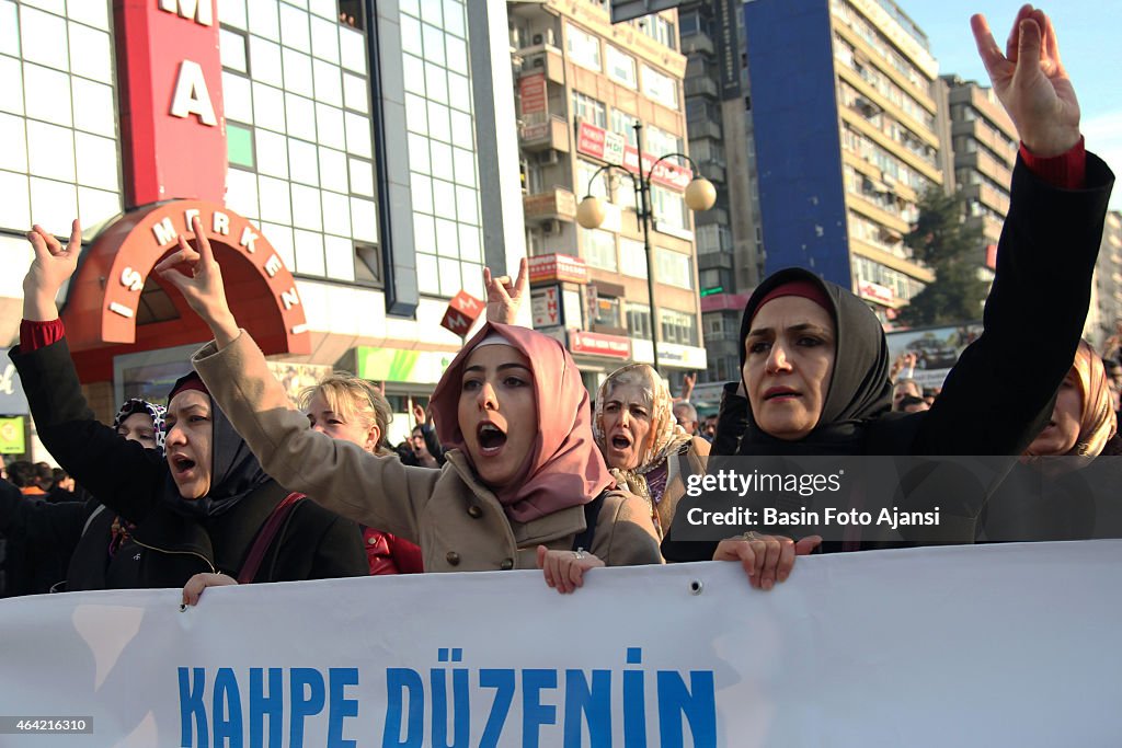 Protesters show the symbol of MHP with their fingers,...