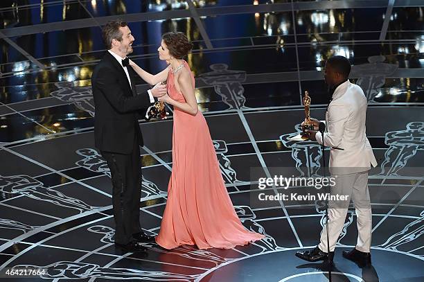 Patrick Osborne accepts the Best Animated Short Film Award for 'Feast' from actors Anna Kendrick and Kevin Hart onstage during the 87th Annual...