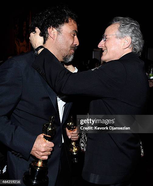 Directors Alejandro Gonzalez Inarritu, winner of Best Original Screenplay, Best Director, and Best Motion Picture, for 'Birdman' and Michael Mann...