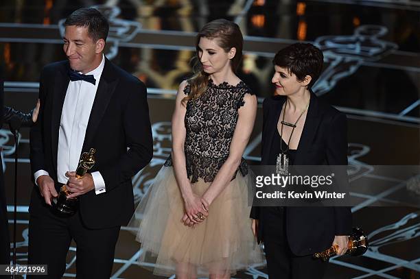 Journalist Glenn Greenwald, Lindsay Mills, and filmmaker Mathilde Bonnefoy accept Best Documentary Feature for 'Citizenfour' onstage during the 87th...