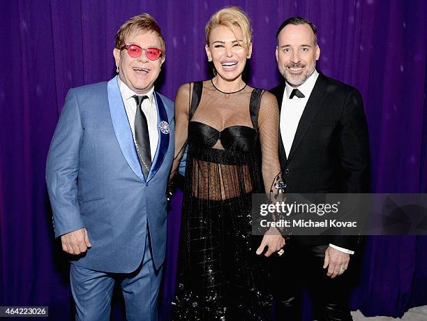 Sir Elton John, CEO of Neuro Drinks Diana Jenkins, and David Furnish attend the 23rd Annual Elton John AIDS Foundation Academy Awards Viewing Party...