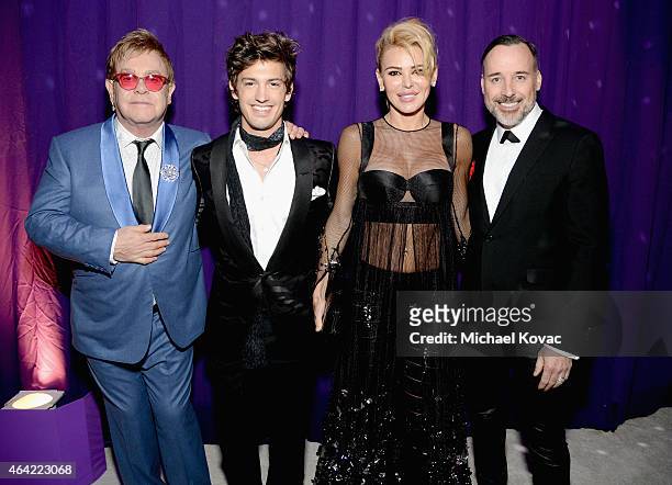 Sir Elton John, singer-songwriter Asher Monroe, CEO of Neuro Drinks Diana Jenkins, and David Furnish attend the 23rd Annual Elton John AIDS...