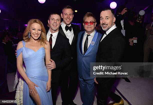 Singer songwriter Kylie Minogue, Jake Shears of the band Scissor Sisters, guest, Sir Elton John, and David Furnish attend the 23rd Annual Elton John...