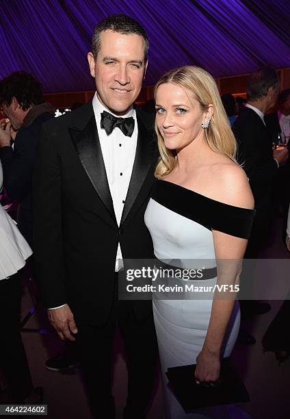 Jim Toth and Reese Witherspoon attend the 2015 Vanity Fair Oscar Party hosted by Graydon Carter at the Wallis Annenberg Center for the Performing...