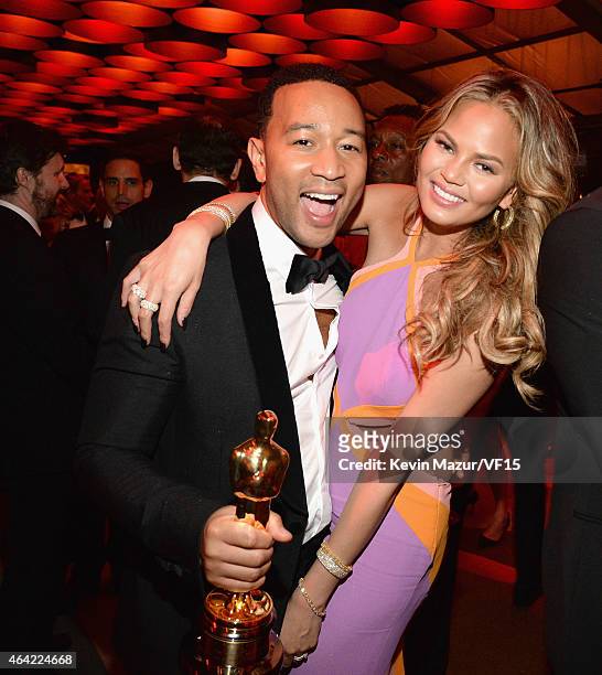 John Legend and Chrissy Teigen attend the 2015 Vanity Fair Oscar Party hosted by Graydon Carter at the Wallis Annenberg Center for the Performing...