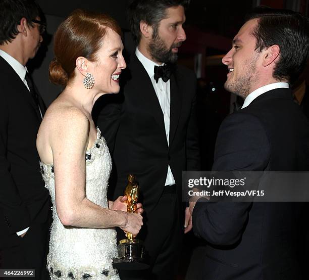 Actress Julianne Moore, director Bart Freundlich and actor Josh Hutcherson attend the 2015 Vanity Fair Oscar Party hosted by Graydon Carter at the...