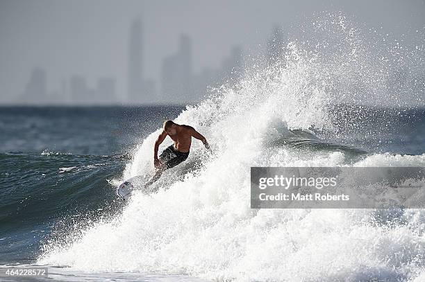 Mick Fanning of Australia surfs at Snapper Rocks on February 23, 2015 on the Gold Coast, Australia.