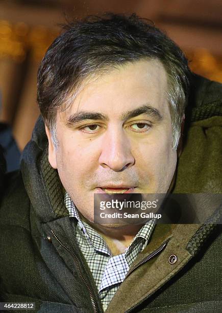 Former Georgian president Mikheil Saakashvili speaks to the media as he attends an evening ceremony to commemorate victims of the Maidan uprising one...