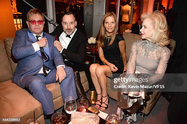 Elton John, David Furnish and Lynn Wyatt attend the 2015 Vanity Fair Oscar Party hosted by Graydon Carter at the Wallis Annenberg Center for the...