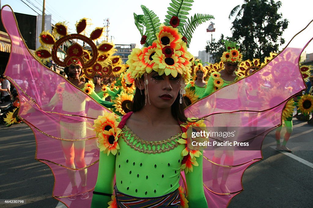 A participant wearing a butterfly costume during the Caracol...