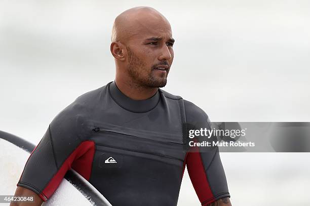 Freddy Patacchia Jr. Of Hawaii watches the surf at Snapper Rocks on February 23, 2015 on the Gold Coast, Australia.