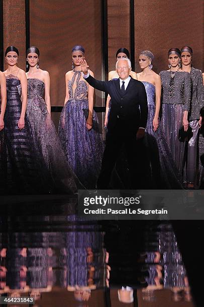 Fashion designer Giorgio Armani acknowledges the applause of the audience after the Giorgio Armani Prive show as part of Paris Fashion Week Haute...